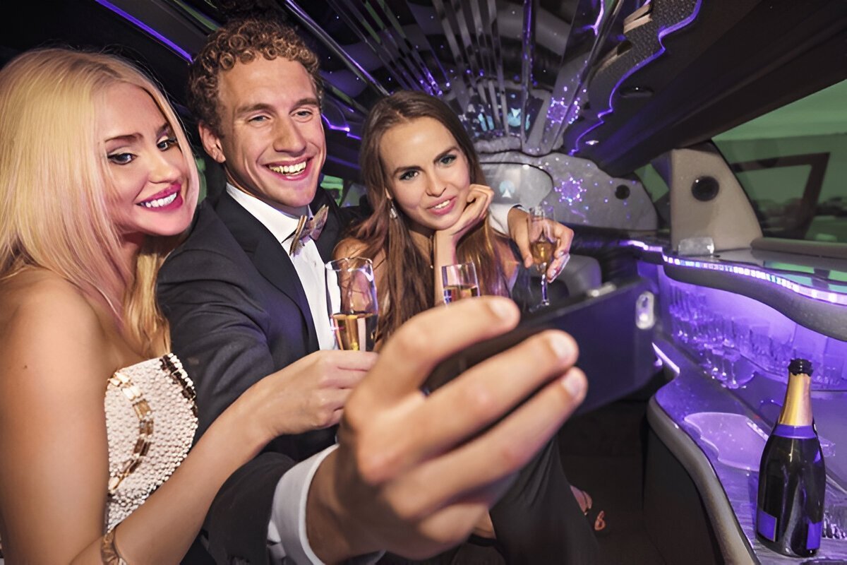 A large group celebrating in Limo Rentals, Safety & Arrival Tips