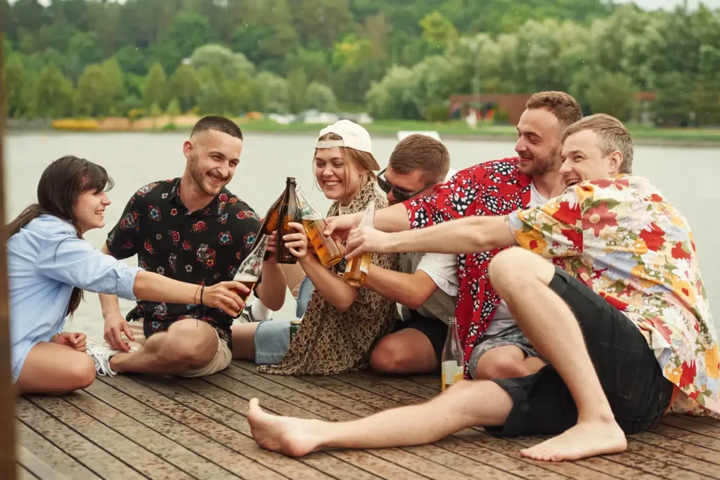 people enjoying lakefront party in lake harmony
