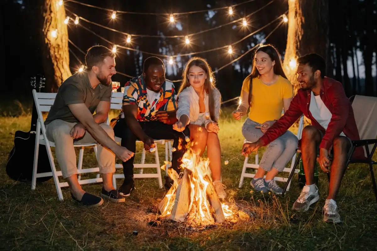 teenagers enjoying bonfire party in poconos